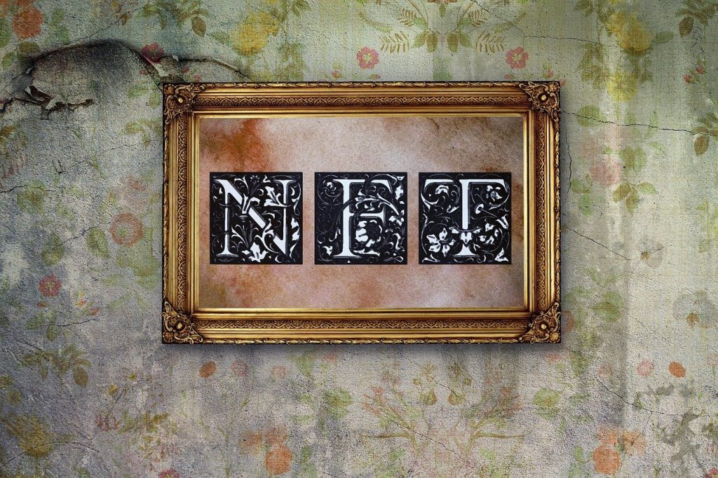 Ornate gold frame with the letters 'NFT' in black and white against a vintage wall.